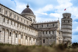 Historic architecture with the Leaning Tower of Pisa under a blue sky, Pisa, Italy, Europe