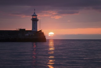 Lighthouse on sunrise. Yalta, Crimea, Ukraine, Europe