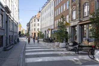 Copenhagen, Denmark, September 03, 2021: People and shops on Skindergade in the historic city