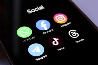 In this photo illustration, WhatsApp, Facebook, Instagram, Telegram, TikTok and Threads apps
