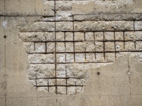 Old wall background with concrete and rusty metal