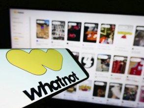 Stuttgart, Germany, 07-23-2022: Mobile phone with logo of US e-commerce company Whatnot Inc. on