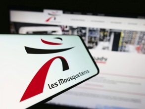 Stuttgart, Germany, 12-08-2023: Smartphone with logo of French company ITM Entreprises S.A. (Les