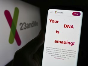 Stuttgart, Germany, 11-03-2023: Person holding cellphone with webpage of US biotechnology company