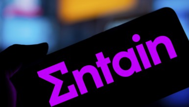 Dhaka, Bangladesh- 28 Nov 2024: Entain logo is displayed on smartphone.Entain plc is an