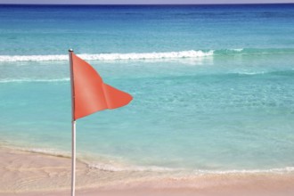 Dangerous red flag in tropical beach for avoid bathing