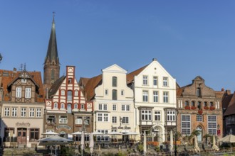 Historic surrounding gabled houses with many shops and restaurants on the square Am Sande in the