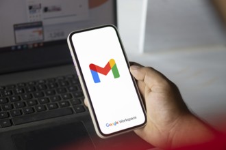 Google Gmail logo is displayed on smartphone