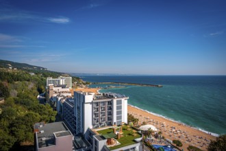 View of a hotel on the beach overlooking the Black Sea under a blue sky, Golden Sands, Varna,