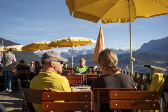 People enjoying the sun in the mountains under parasols, Garmisch-Partenkirchen