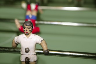 Aged table foosball player macro detail