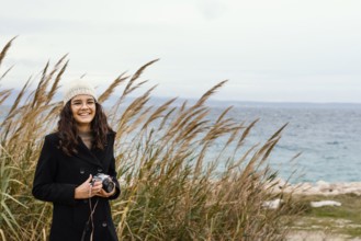 Young beautiful woman nature with camera 6