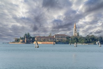 View from Lido to abandoned Poveglia Island, a former Psychiatric Hospital in Venice, Italy, Europe