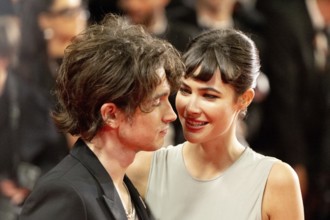 Cannes, France - 16.5.2024: Elijah Hewson and Gracie Burns on the red carpet during the 78th Cannes