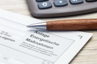Close-up of tax return, energy measures attachment