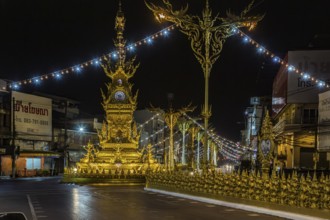 Clock Tower of Chiang Rai monument designed by local artist Chalermchai Kositpipat to honor the
