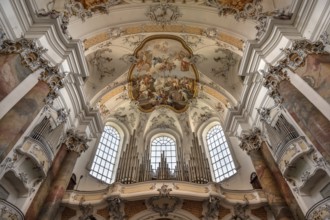Organ loft and vault with ceiling frescoes in the baroque Basilica of St Alexander and Theodor,