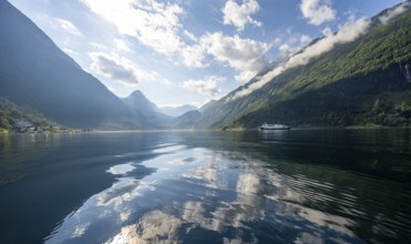 Atmospheric fjord landscape at Geirangerfjord with reflection, Møre og Romsdal, Norway, Europe