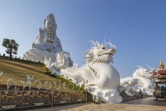 Chinese dragons line the steps up to the Guan Yin (Goddess of Mercy) statue at Wat Huay Pla Kang