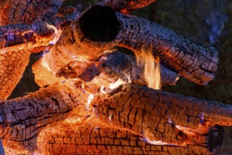 Logs of wood burning in a bonfire in the interior of the state of Minas Gerais during the
