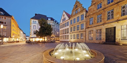 Old market with fountain and town houses in the evening, Bielefeld, East Westphalia-Lippe, North