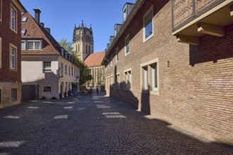 Liebfrauen-Überwasserkirche, church, residential building, apartment blocks, brick building, blue