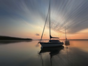Evening atmosphere, sailing boats on Lake Starnberg, zoom effect, Bavaria, Germany, Europe