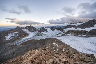 Sunset at the summit of the Becher, picturesque high mountain landscape, view of mountain peaks