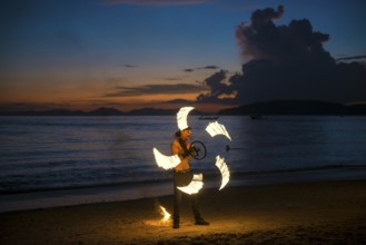 Fire show, jugglers with fire, Ao Nang Beach, sunset, Ao Nang, Krabi, Thailand, Asia