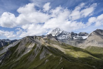 View of picturesque mountain landscape with snow-covered summit of the Großglockner, Wiener