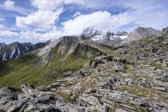 Summit of Kastenegg, view of picturesque mountain landscape with snow-covered summit of the