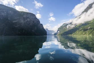 Atmospheric fjord landscape at Geirangerfjord with reflection, Møre og Romsdal, Norway, Europe