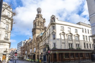 City street view featuring the london coliseum, a historic theatre located in st. Martin's lane,