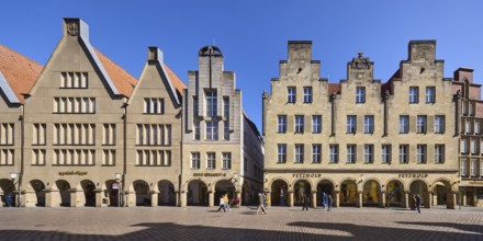 Old town, historical buildings, facade, window, gable, arcades, pedestrians as secondary motif,
