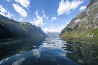 Atmospheric fjord landscape, Geirangerfjord with reflection, Møre og Romsdal, Norway, Europe
