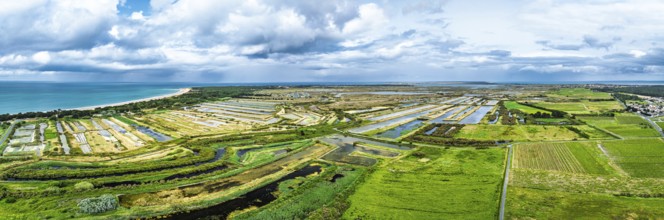 Panorama of The Lilleau des Niges National Nature Reserve from a drone, The salt marshes,