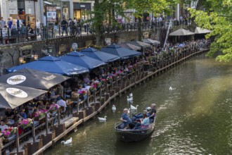 The old town centre of Utrecht, Oudegracht, around 2 km long with many old houses, shops,