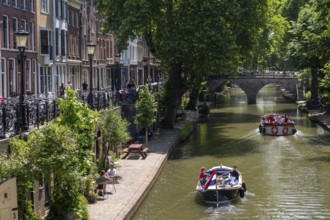 The old town centre of Utrecht, Oudegracht, around 2 km long with many old houses, shops,