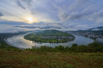 River landscape in sunrise mood with clouds and haze in the air, summer, Rhine bend Boppard,