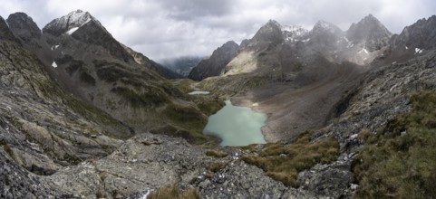 View of mountain landscape, turquoise-blue mountain lake Großer Gradensee, behind summit of