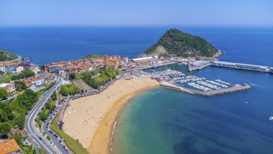 Aerial view of getaria, a charming coastal town in the basque country, spain, showcasing its
