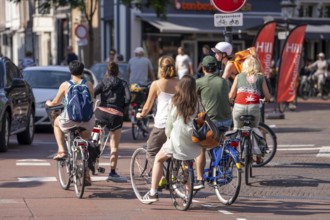 Cycling in the Netherlands, Utrecht, typical riding style with 2 people on one bike