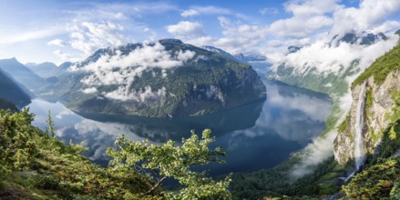 Panorama over the Geirangerfjord, Gjerdefossen waterfall, at Ørnesvingen viewpoint, atmospheric