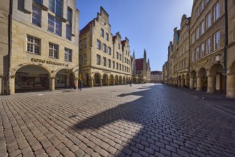 Old town, historic buildings, facade, window, gable, arcades, cobblestone street, pedestrians as