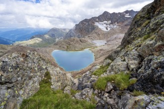 High mountain landscape, view of mountains and mountain lake Vogelhüttensee, Stubai Alps, South