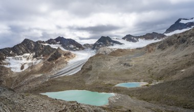 Glacial lakes in high mountain landscape with glacier tongue of the Übeltalferner, Stubai Alps,