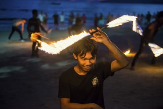 Fire show, jugglers with fire, Ao Nang Beach, sunset, Ao Nang, Krabi, Thailand, Asia