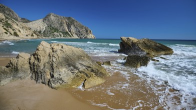 Beach, Kavo Paradiso, Paradise Beach, waves crashing against rocks on a sunny beach, Kefalos, Kos,