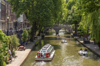 The old town centre of Utrecht, Oudegracht, around 2 km long with many old houses, shops,