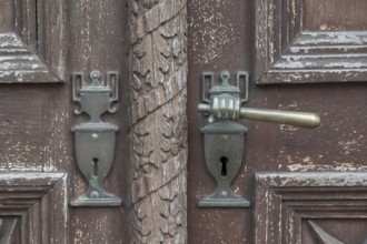Art Nouveau door handles from around 1900 on a front door, Bavaria, Germany, Europe